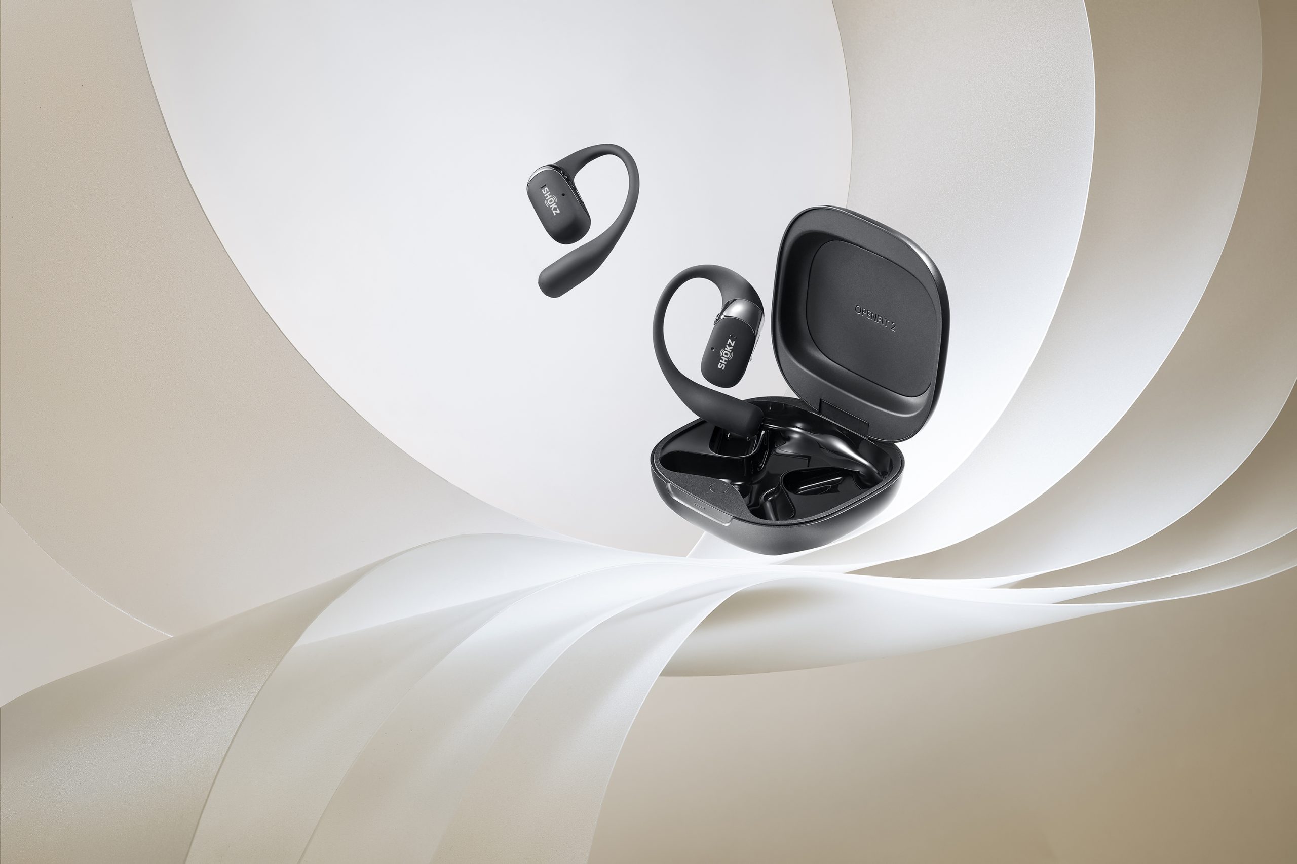 Shokz OpenFit 2+ earbuds in charging case